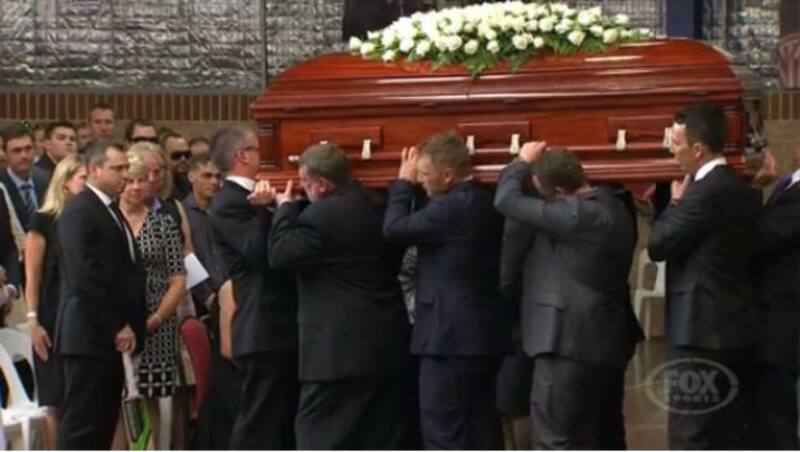 Phil Hughes' coffin was carried by his father Greg, brother Jason, cricketers Aaron Finch and Tom Cooper.