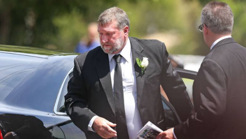 Phillip Hughes' father Greg at the funeral © Getty Images