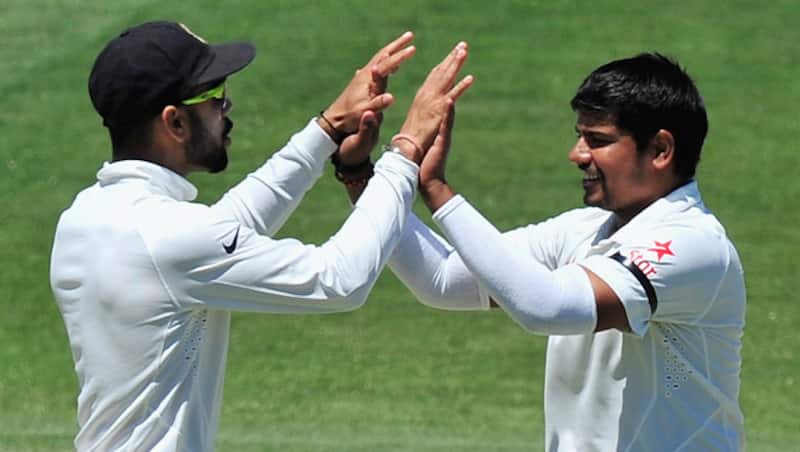 Karn Sharma (right) took three wickets &Acirc;&copy; Getty Images