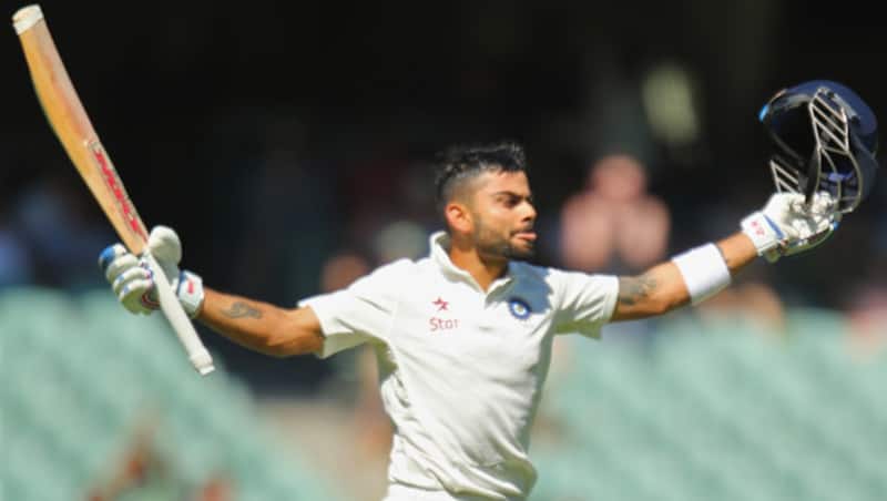 Virat Kohli celebrated his landmark emphatically, and truly did show his colours &copy; Getty Images