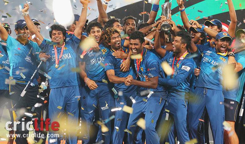 Lasith-Malinga-of-Sri-Lanka-and-his-team-celebrate-with-the-trophy-on-the-podium-after-winning-the-Final-of-the-ICC-Worl