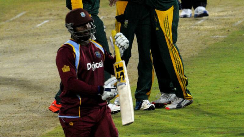 Dwayne Smith departs after getting dismissed on a score of 31 from 28 balls &Acirc;&copy; AFP 