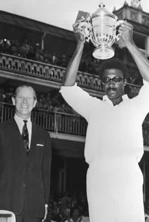 West Indies captain Clive Lloyd with the trophy © Getty Images