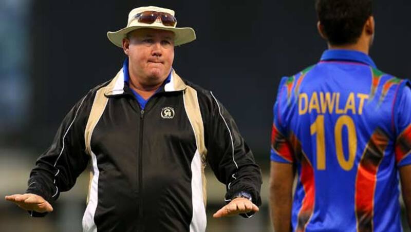 Andy Moles (left) said he feels sorry for Peter Moores, as he believes it is always the players' job to bring in the desired results &copy; Getty Images
