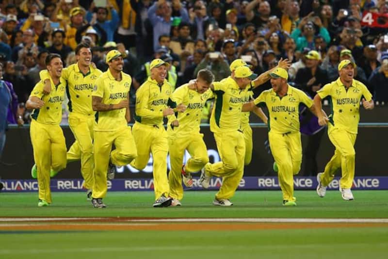 The Australian team rushes out to celebrate the World Cup triumph &copy; Getty Images