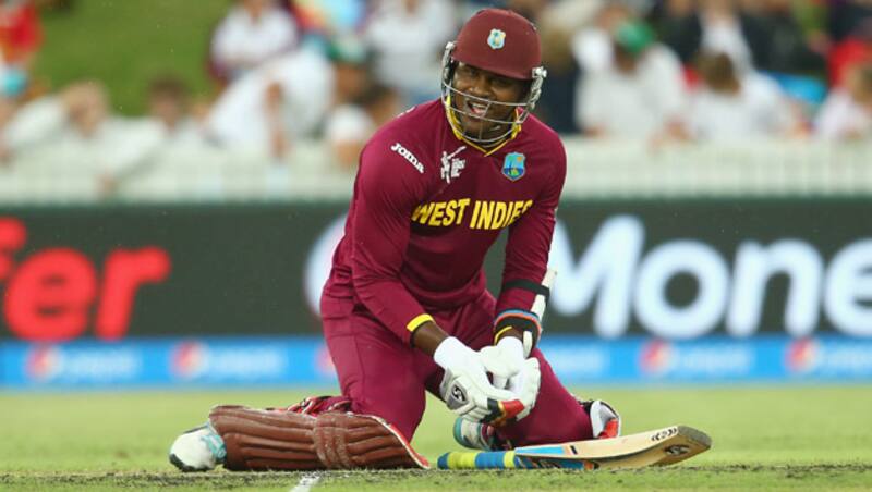 Marlon Samuels (above) was dismissed for a mere couple after he was unfortunately ran out by Virat Kohli © Getty Images