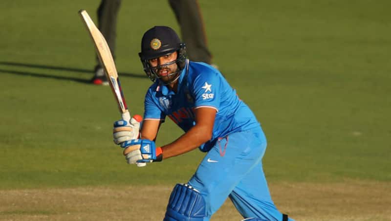 Rohit Sharma (above) was dismissed for seven by Jerome Taylor after being caught behind by Denesh Ramdin &copy; Getty Images