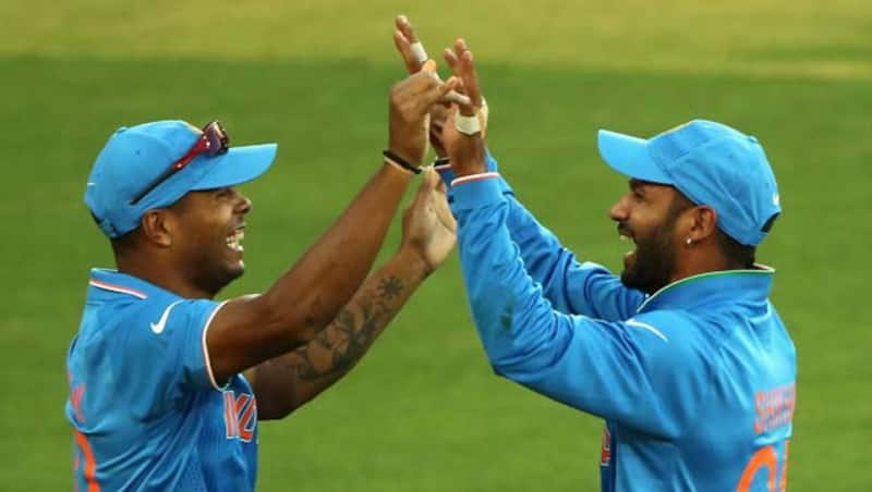 Jerome Taylor was dismissed for mere 11 by Umesh Yadav (left) after being caught by himself © Getty Images