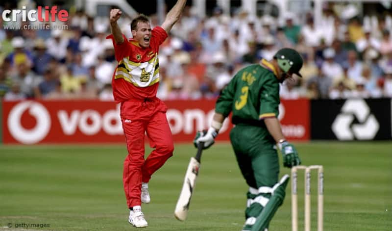 Neil Johnson celebrates the prized wicket of Jacques Kallis