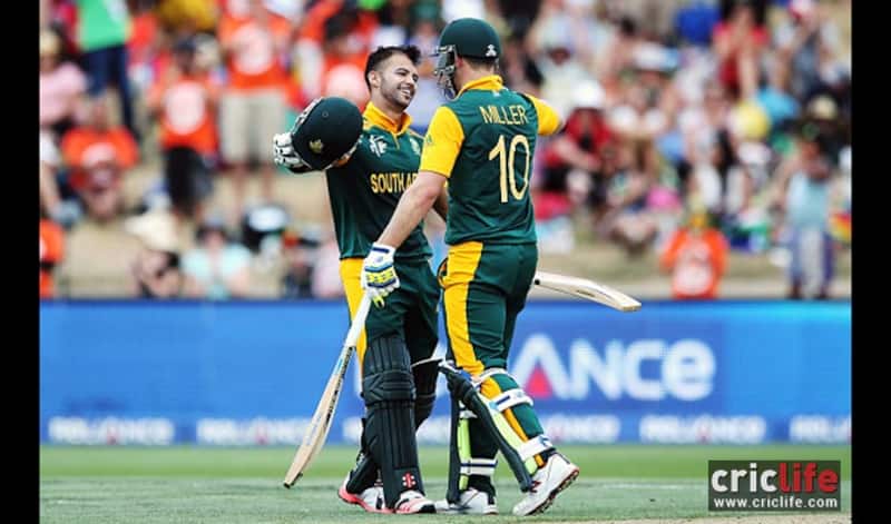 JP Duminy is being congratulated by David Miller after he completes his hundred