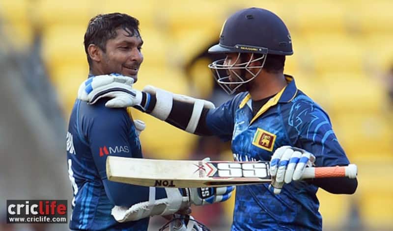 LahiruThirimanne and Kumar Sangakkara celebrate after the winning runs are hit