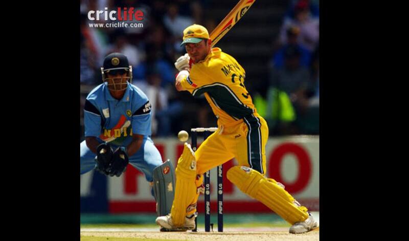 Damien Martyn prepares to play a cut shot