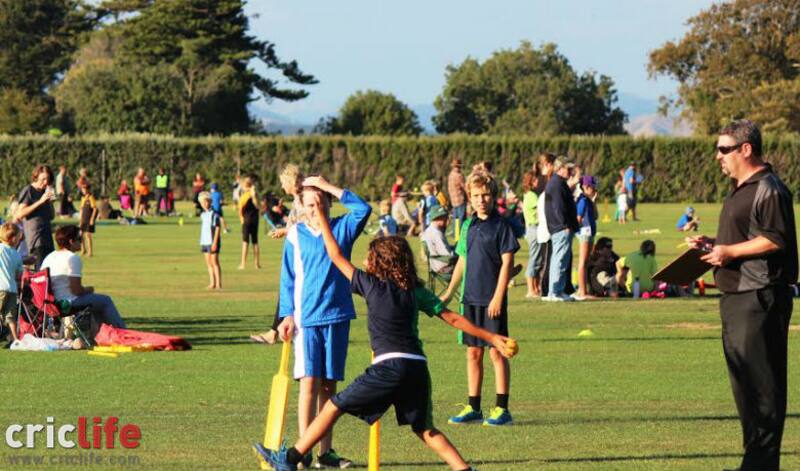 Young kids play cricket in Gonville, Wanganui, as their parents flock together and watch (Image Courtesy: Dilan Raj)