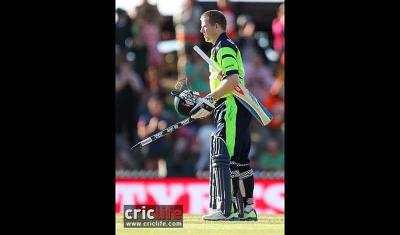 Niall O&acirc;Brien picks up a stump as memorabilia after his team&acirc;s famous win