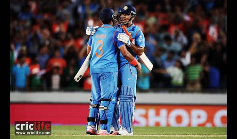 Suresh Raina and MS Dhoni celebrate the winning moment