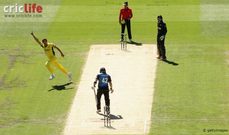 Mitchell Starc celebrates after getting the wicket of Brendon McCullum during the ICC Cricket World Cup 2015 final against New Zealand