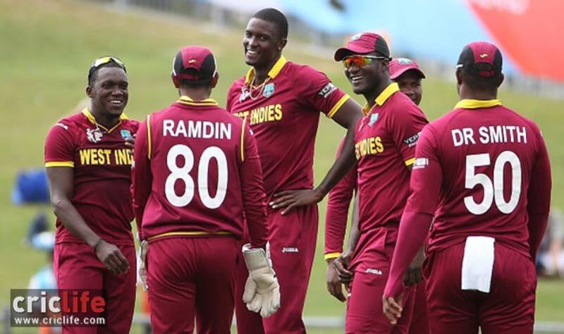Jason Holder along with his teammates in joyous mood after the fall of a UAE batsman.