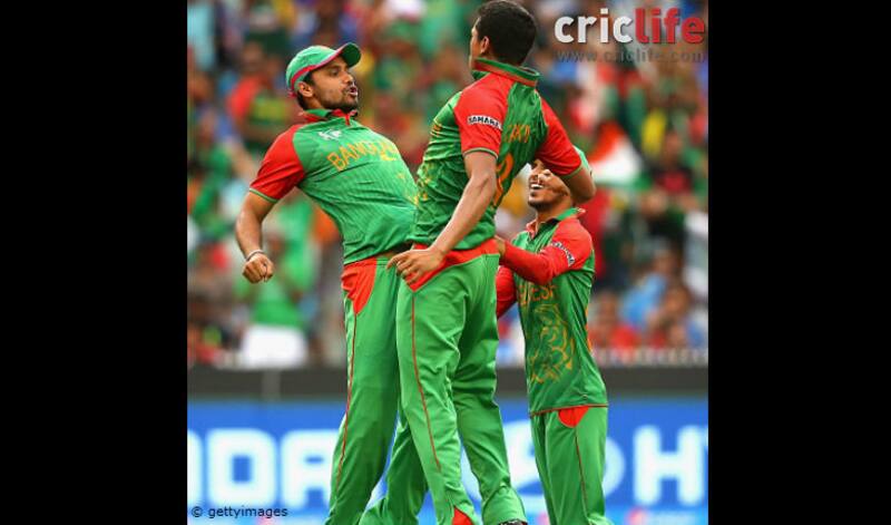 Mashrafe Mortaza and Taskin Ahmed celebrate the wicket of Ajinkya Rahane