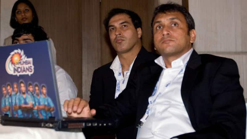 Robin Singh (left) with Rahul Sanghvi © Getty Images