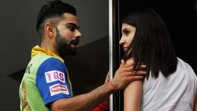 The RCB-DD match was technically alive when Virat Kohli interacted with Anushka Sharma &copy; PTI