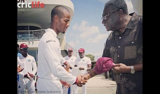 Jason Holder congratulates Shai Hope on his first Test cap