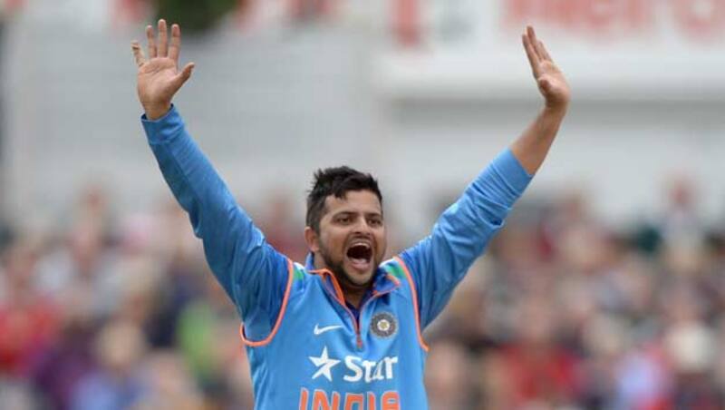 Suresh Raina strongly supports his captain &Acirc;&copy; Getty Images