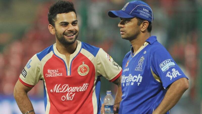 Virat Kohli (left) said that Rahul Dravid must have had some obligation or commitment &Acirc;&copy; AFP (File Photo)