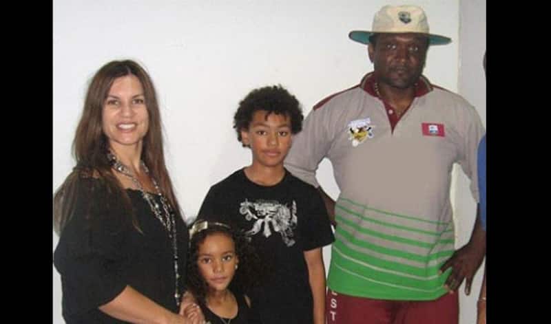 Connie and Carl Hooper with their two children. Photo: Kaieteur News