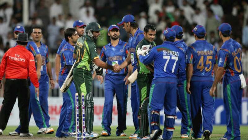 Afghanistan (in blue) sealed the other qualifying spot on offer Thursday with a six-wicket win over Papua New Guinea &copy; Getty Images (File Photo)
