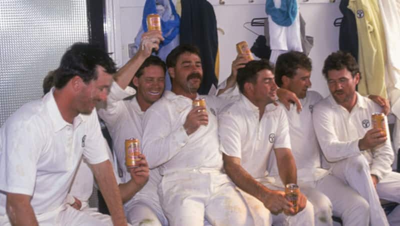 The Australians celebrate their Ashes 1989 victory with, youâve guessed it right, beers; you cannot miss David Boonâs moustache © Getty Images