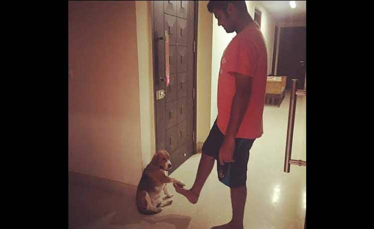 RP Singh bonding with his pet.