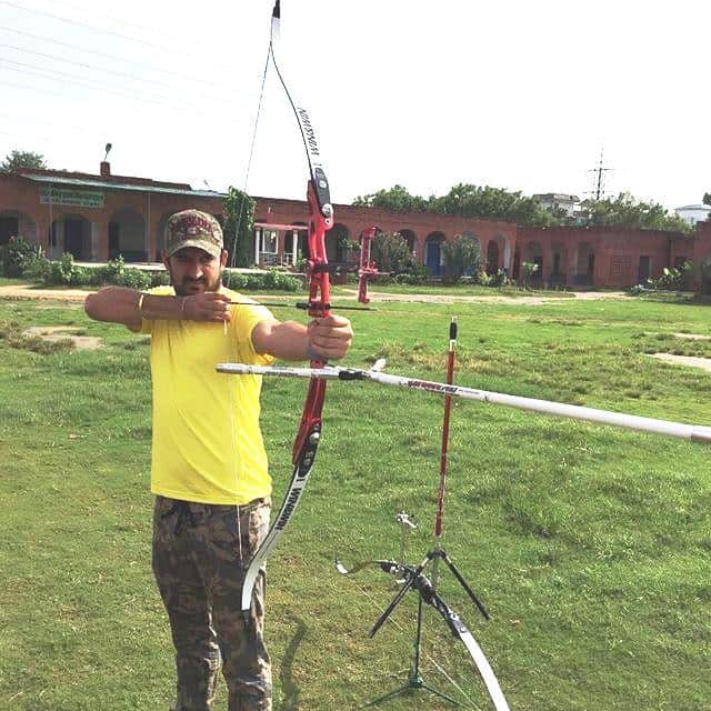 Mohit Sharma trying his hand at archery