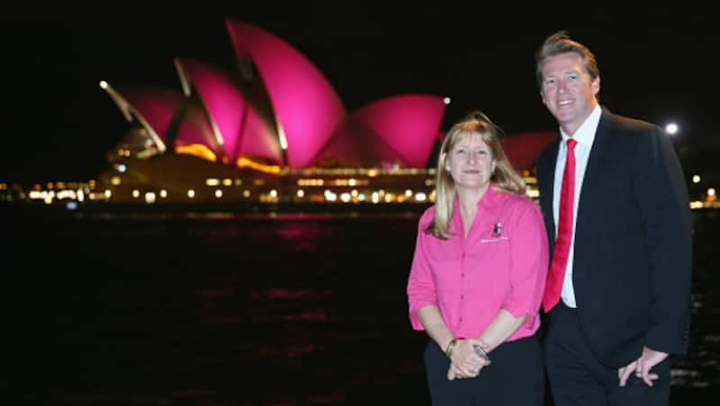 Glenn McGrath and nurse Elaine Arnold, with Sydney Opera House in background turned pink to raise Breast Cancer awareness &Acirc;&copy; Getty Images