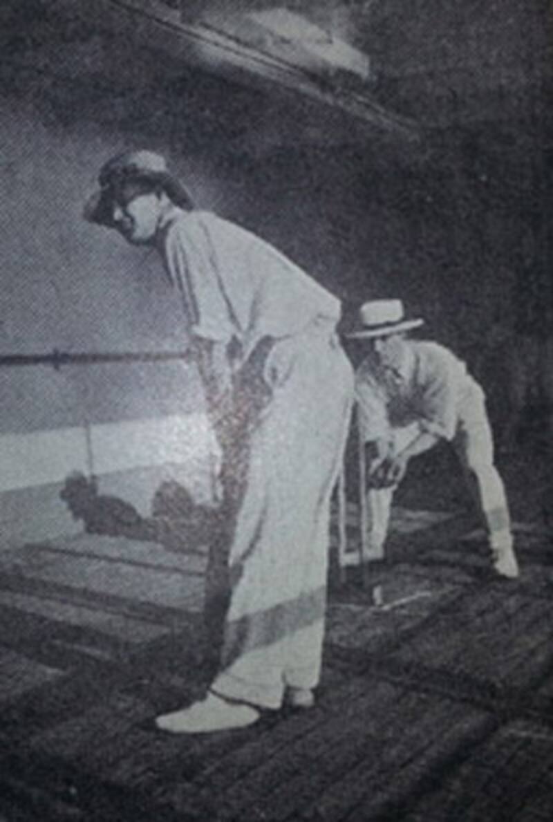 Warner bats on the deck. Notice the low roof. Photo from: &acirc;How we Recovered The Ashes&acirc; by PF Warner.