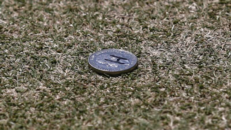 The coin toss is one of cricket's oldest, most steadfast traditions © Getty Images
