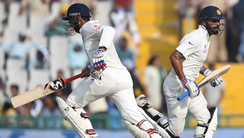 Cheteshwar Pujara (left) and Murali Vijay once again put up a strong stand of 86 runs for the second wicket &Acirc;&copy; AFP