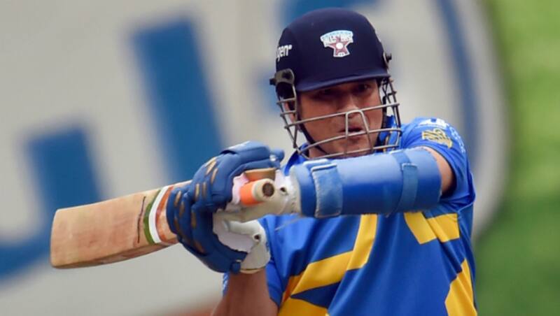 Sachin Tendulkar (above) scored his half-century and fell for 56 to Daniel Vettori &Acirc;&copy; AFP