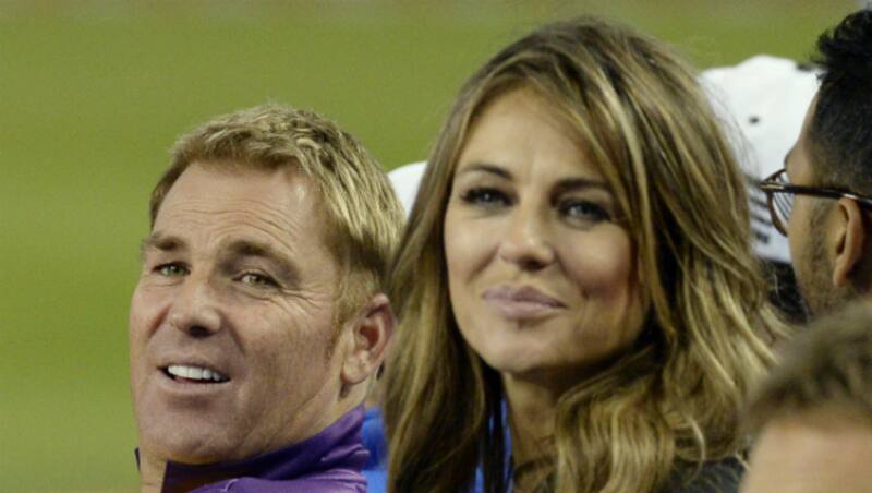 Shane Warne (left) and Elizabeth Hurley spotted at the Dodger Stadium in Los Angeles during the third Cricket All Stars T20 &Acirc;&copy; Getty Images
