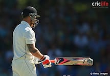 Virender Sehwag and Shane Warne gesture fans at Dodgers Park Stadium