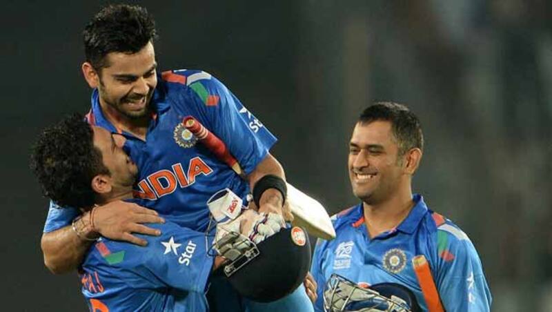 Yuvraj Singh (left) will reunite with former India teammates MS Dhoni (right) and Virat Kohli &copy; AFP