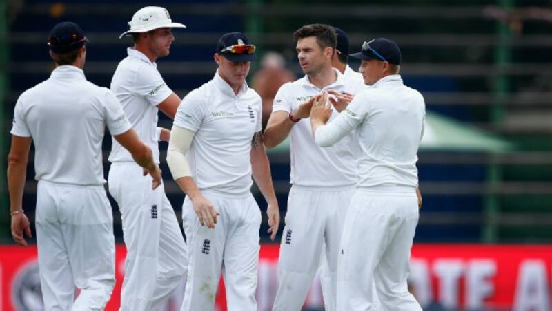 James Anderson (2nd from right) celebrates the dismissal of Chris Morris for 28 off 81 balls &Acirc;&copy; Getty Images