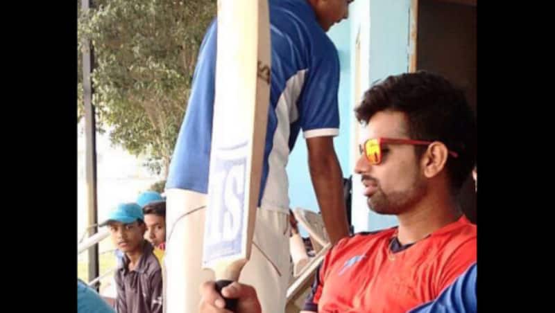 Bhati checking his willow at DY Patil Stadium earlier in 2015. (Photo courtesy: Bhati's Facebook)