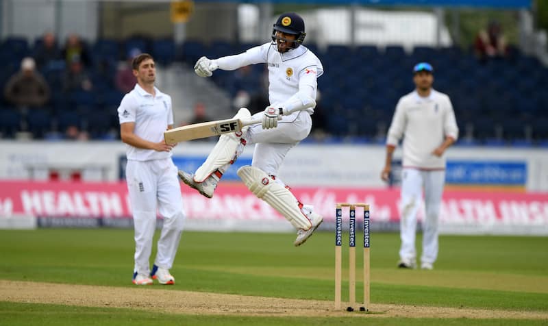Dinesh Chandimal punches his fist in the air after scoring hundred &Acirc;&copy; Getty Images