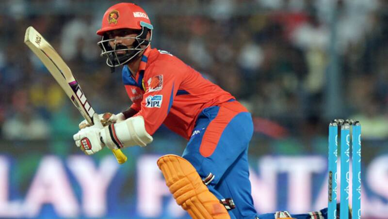 Dinesh Karthik smashed a classy 51 off 29 runs as Gujarat regained the top spot in the Indian Premier League (IPL) points table &copy; AFP