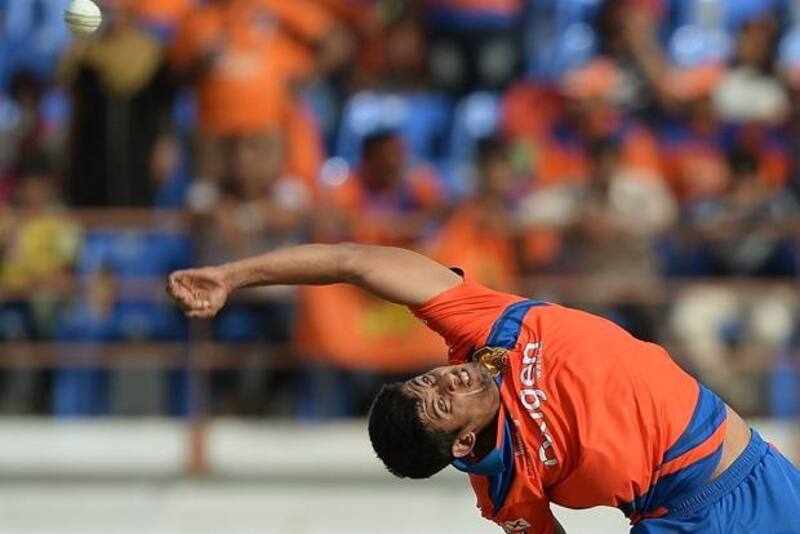 Shivil Kaushik is in the limelight due to his chinaman bowling action &copy; AFP