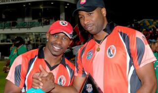 Dwayne Bravo fined for his “friendly push” Kieron Pollard; both cricketers tweet about the incident