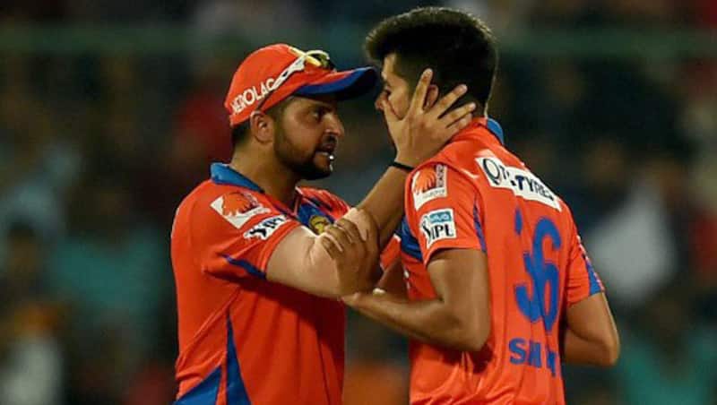 Suresh Raina (Left) showed faith in the young bowler, playing him in as many as six matches in IPL 2016 © AFP