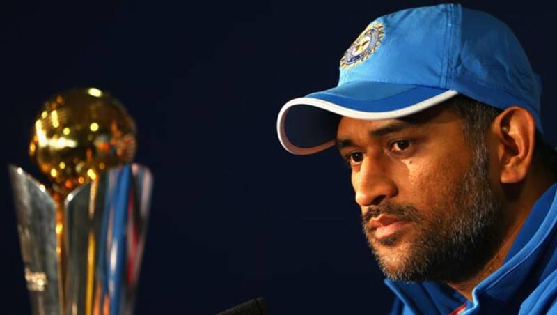 MS Dhoni with the ICC Champions Trophy 2013 in the background &Acirc;&copy; Getty Images
