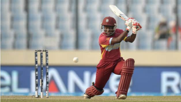 Deandra Dottin hitting one of her signature shots during the ICC Women's World T20 2014 in Bangladesh © Getty Images