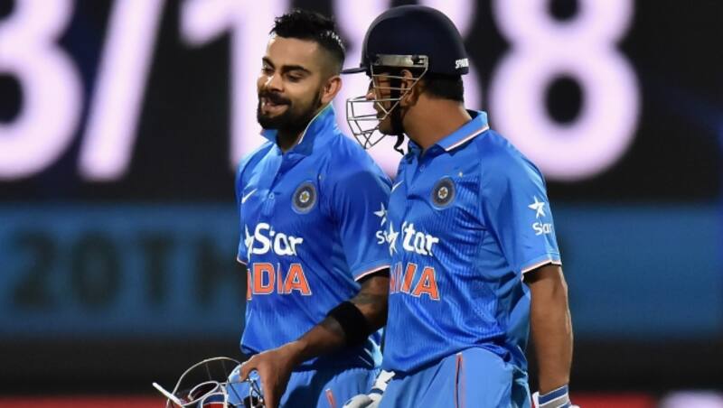 MS Dhoni (Right) will takeover as captain of the T20I side after Virat Kohli successfully led India to a 2-0 Test series win against West Indies recently © Getty Images